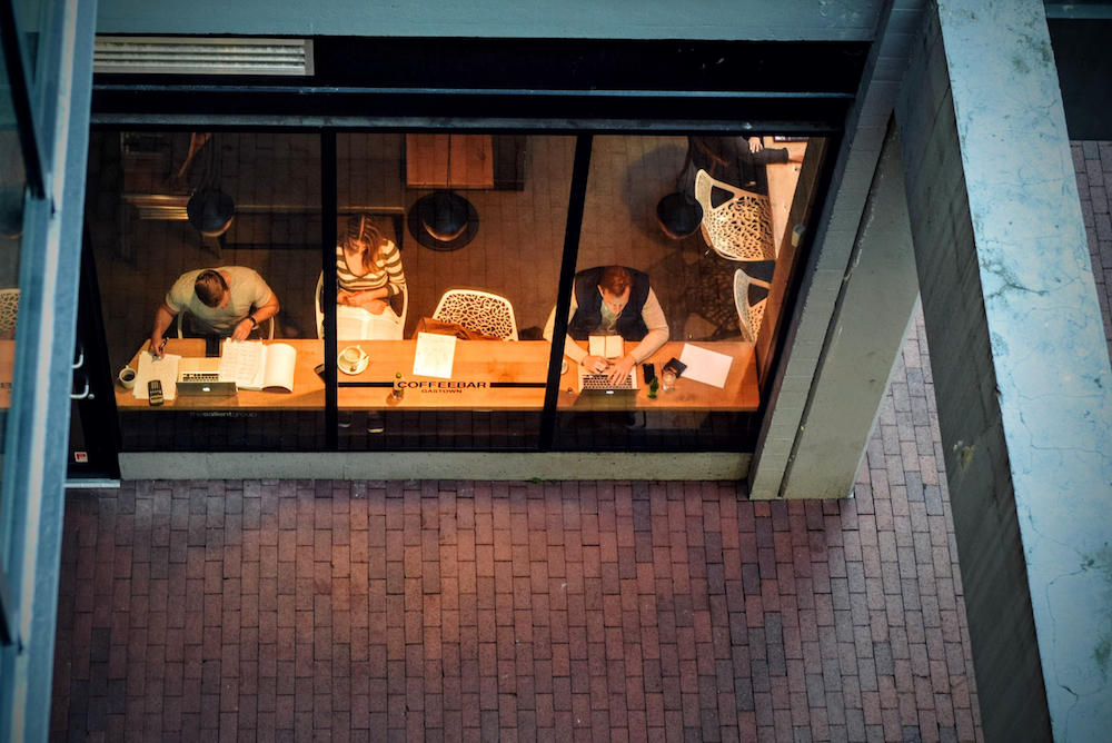 People working at a coffee bar.